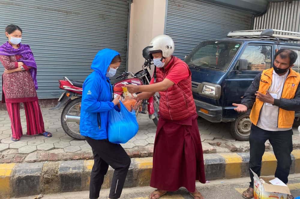 Feeding 1000/day in Nepal during Covid: Geshe Sonam Wangchen of Hope & Challenge NGO hands about food care packages, Nepal