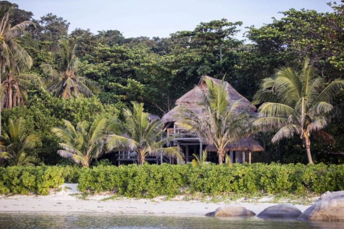 Beach house view from the sea, Nikoi Island, Indonesia