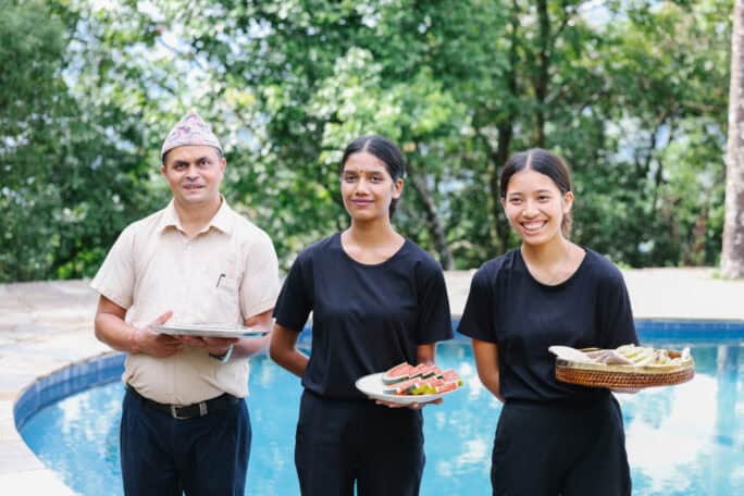 Nepal Tiger Mountain Pokhara Lodge Stewards at pool