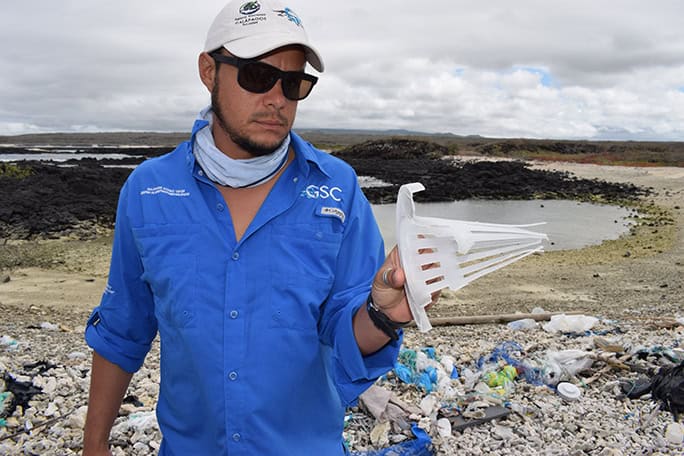 Galapagos Conservation Trust - JP with plastic © Andy Donnelly