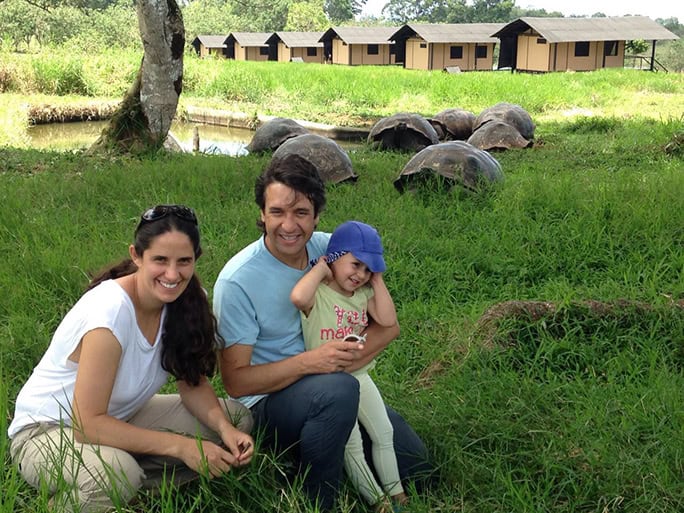 Family & giant tortoises, Floreana Lava Lodge, Galapagos, Tropic Ecuador