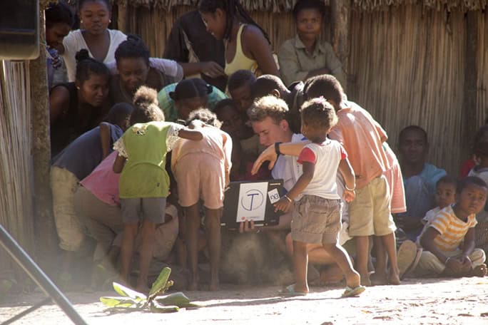 Harry showing video to community for rainwater harvesting for clean water, project Tatirano, SEED Madagascar 2017