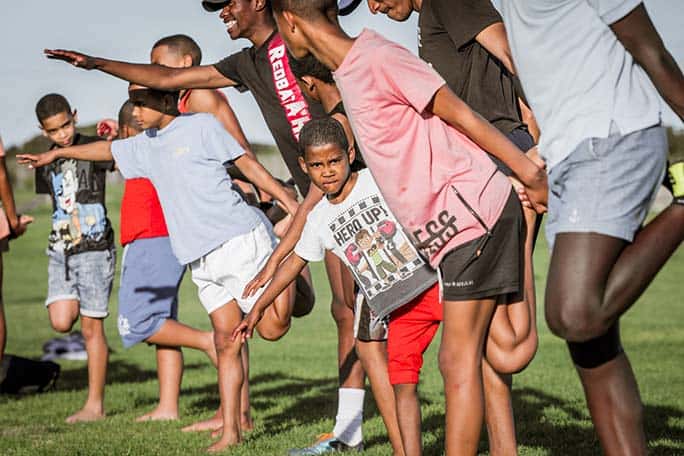 Football Foundation of South Africa (FFSA) Grootbos Foundation © Scott Ramsay Grootbos Nature Reserve - Western Cape - Kids warm-up