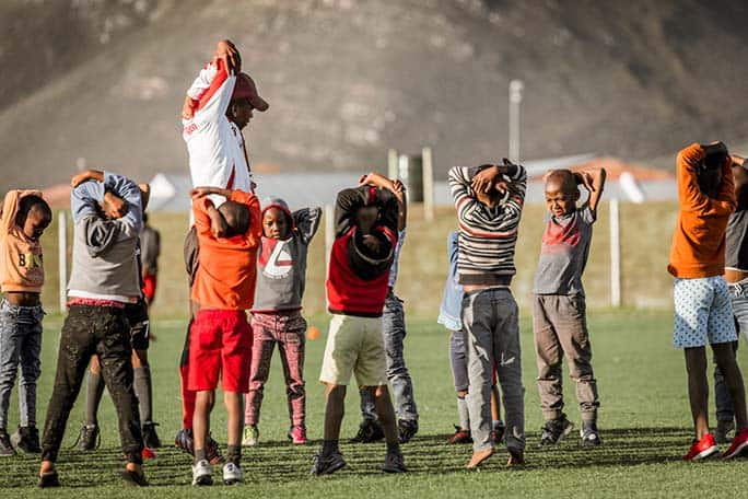 Football Foundation of South Africa (FFSA) Grootbos Foundation © Scott Ramsay Grootbos Nature Reserve - Western Cape - Kids warm-up