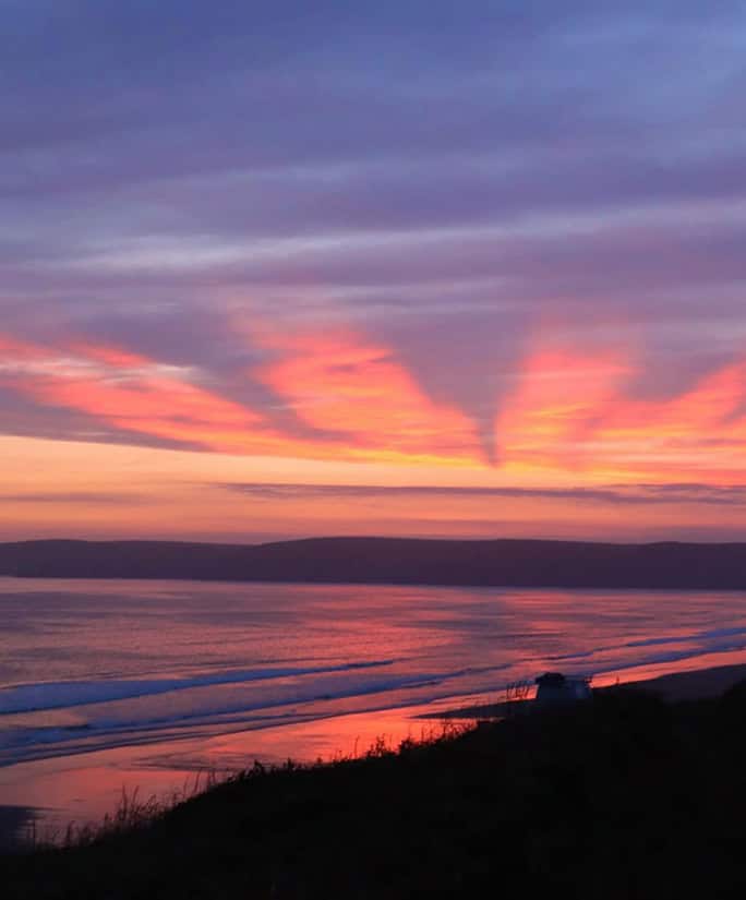 Wales: Adventure Tours UK Yoga Surf Retreat clifftop yoga St Davids view
