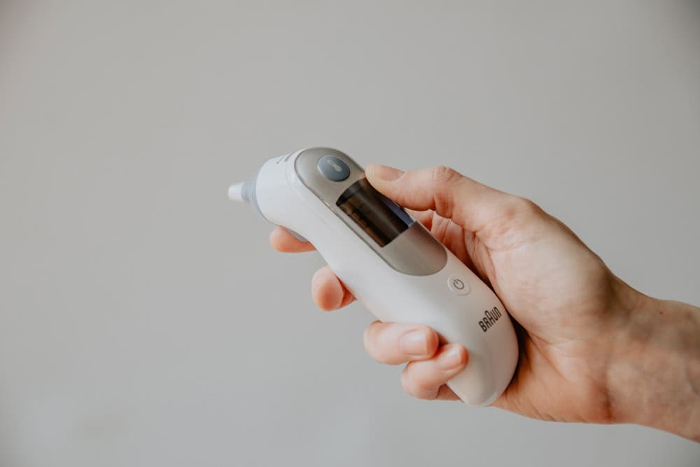 ear thermometer by kelly sikkema on unsplash