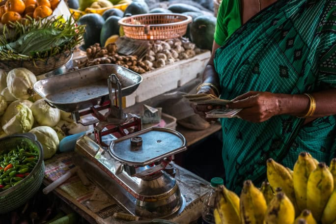 market scales & money, Andaman & Nicobar Islands, India c/o Pau Casals on unsplash.jpg